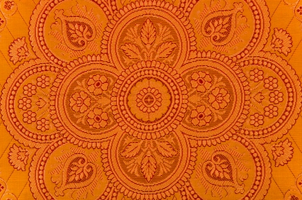 Oriental ornamented textile closeup.